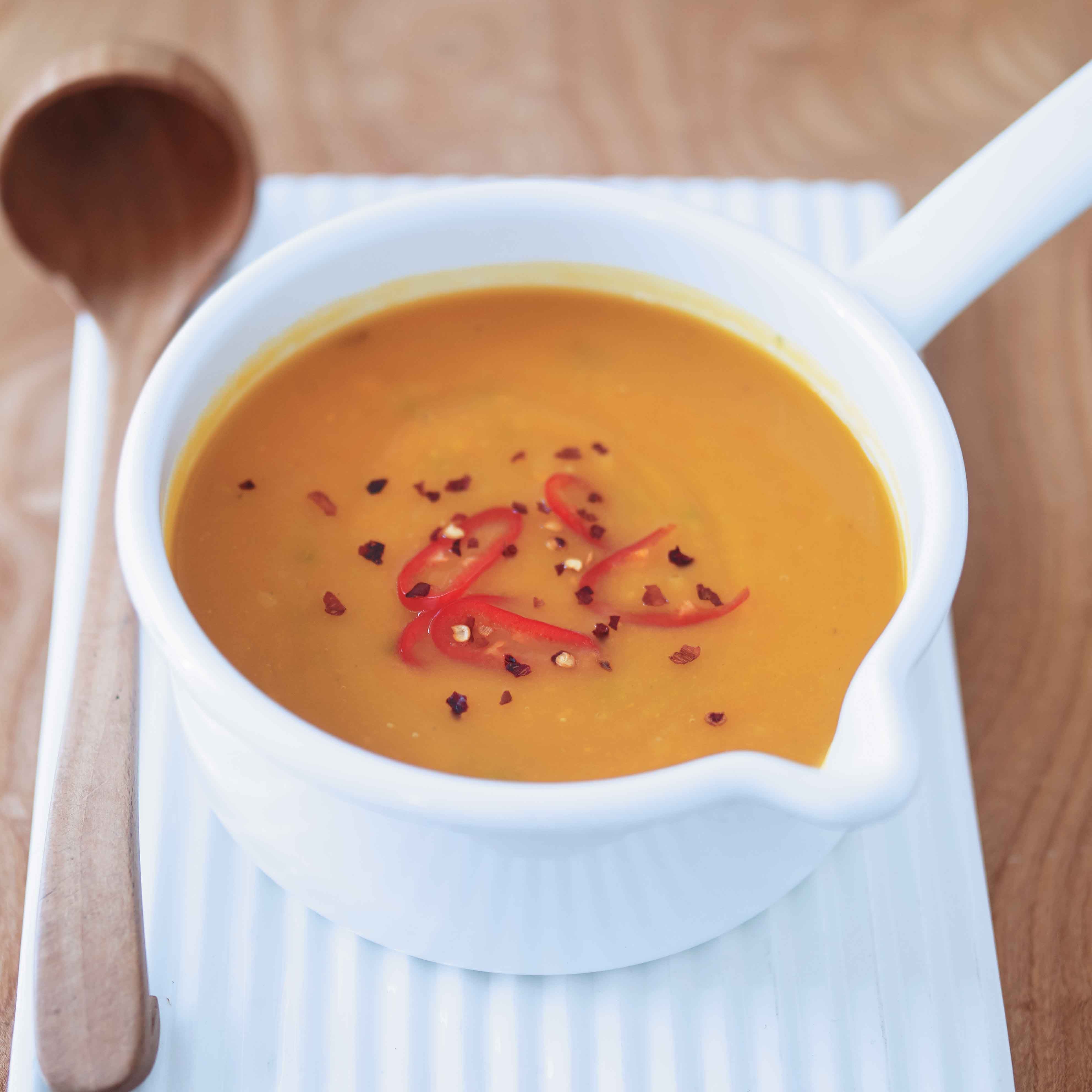 Photo of Hearty golden vegetable soup by WW
