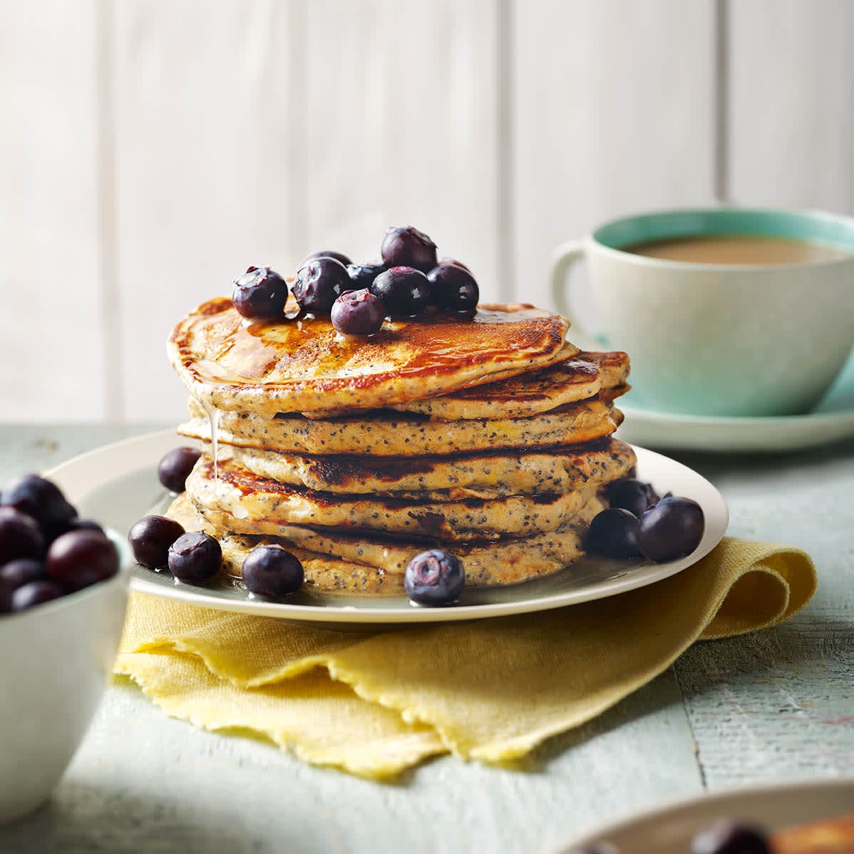Photo of Poppy seed pancakes with lemon syrup & blueberries by WW
