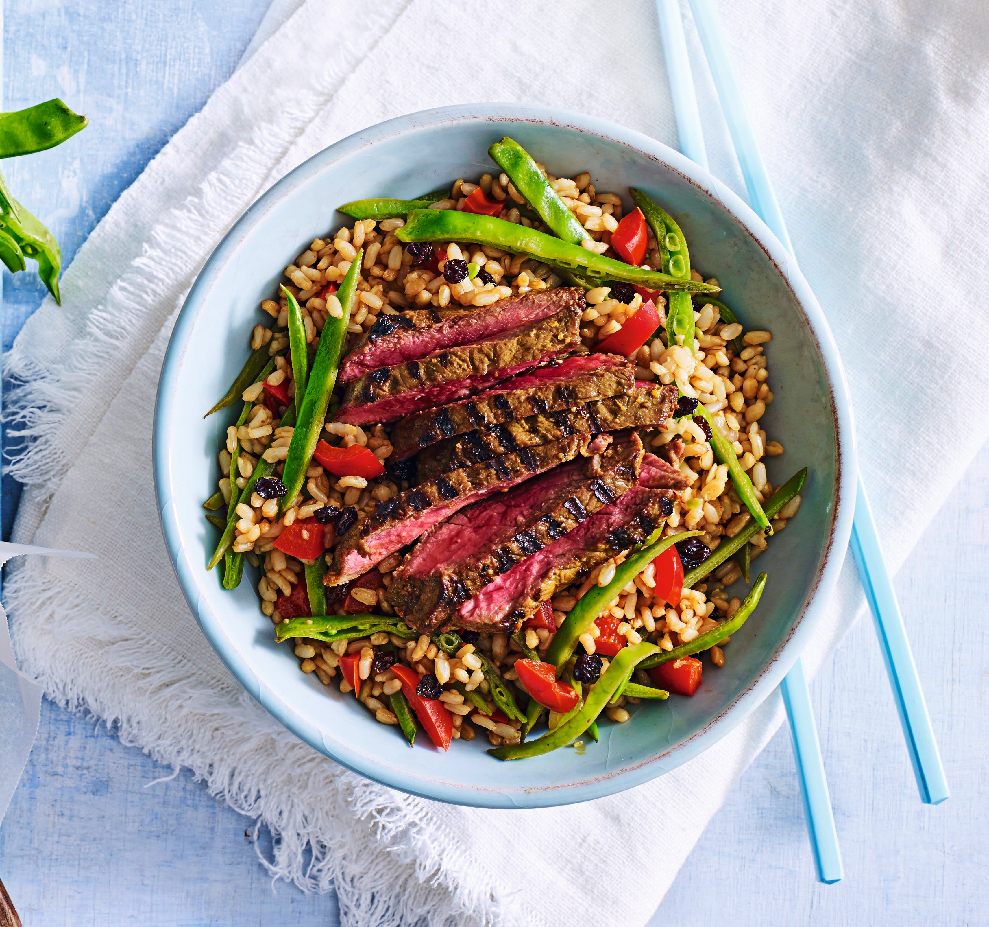 Photo of Turmeric, ginger & honey beef with warm brown rice salad by WW