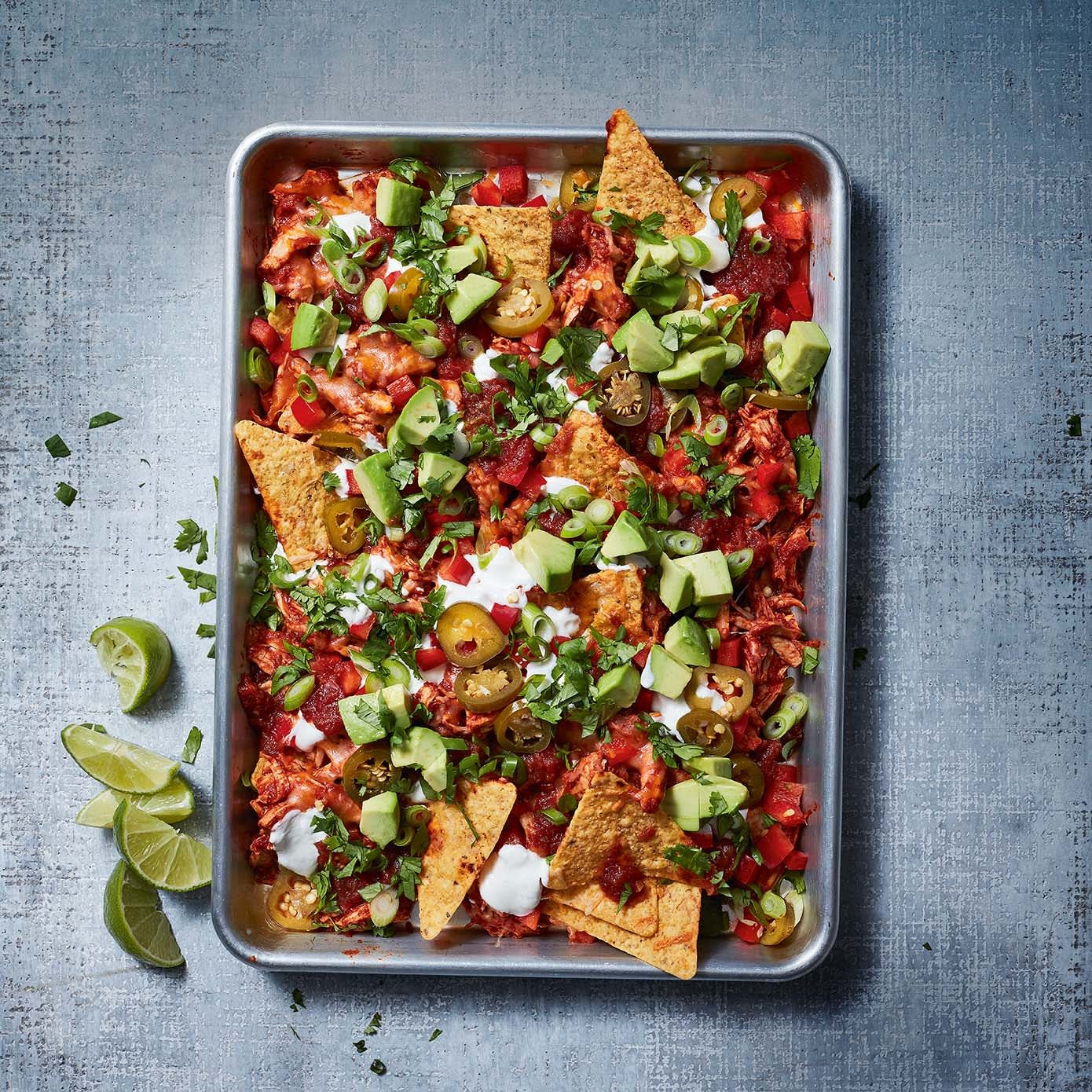 Photo of Spicy chicken nachos with avocado & lime cream by WW