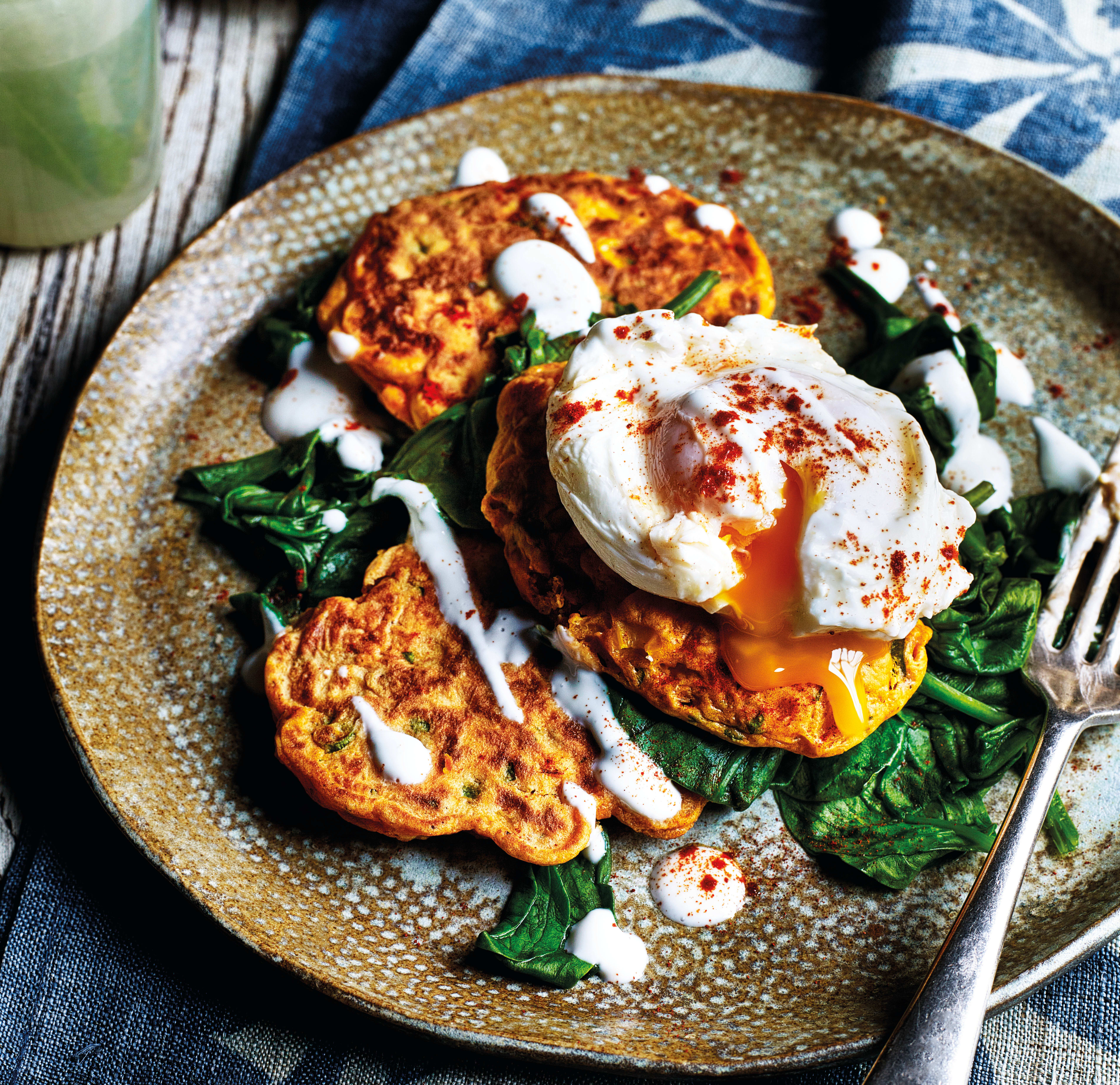 Photo of Spiced corn fritters with spinach & poached eggs by WW