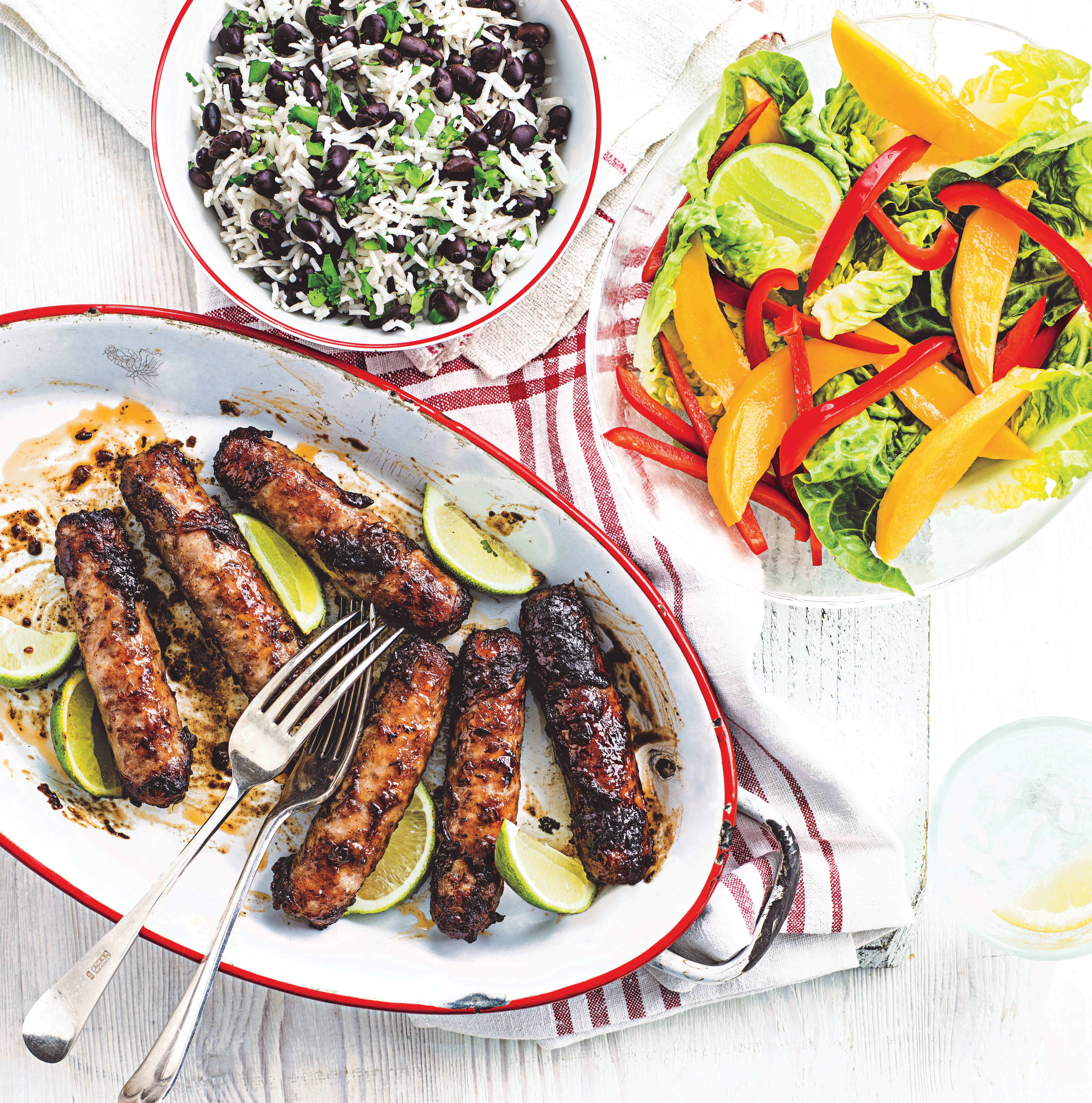 Photo of Jerk sausages with mango salad & rice by WW