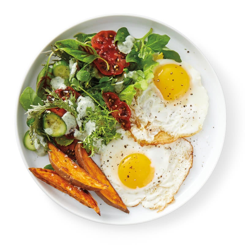 Photo of Eggs with roasted sweet potatoes & greens by WW